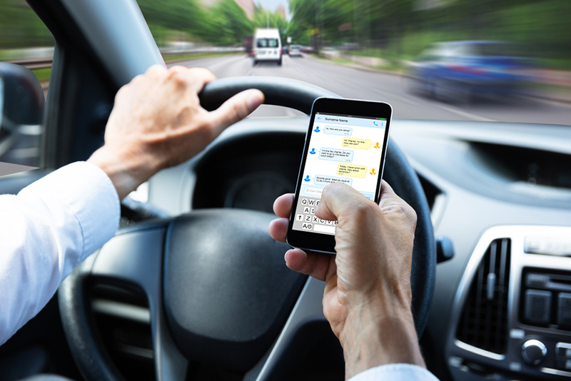 Driver texting behind the wheel – leading cause of distracted driving accidents in Florida